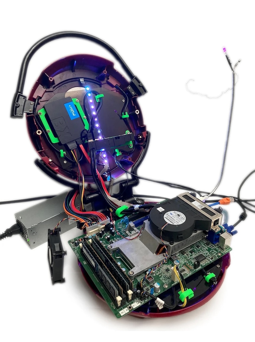 Lean Mean Computing Machine: a George Foreman Computer with lid open, built by artist Doug MacDowell and 
  featured in do not research. George Foreman grill art.
